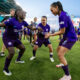 Barbra Banda and Marta celebrate Orlando's victory against Kansas City.
